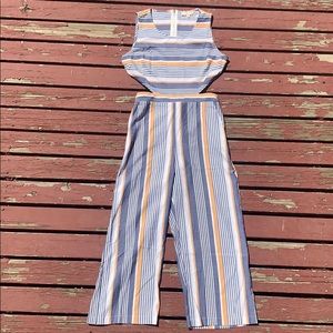 Lower back cut out jumpsuit.